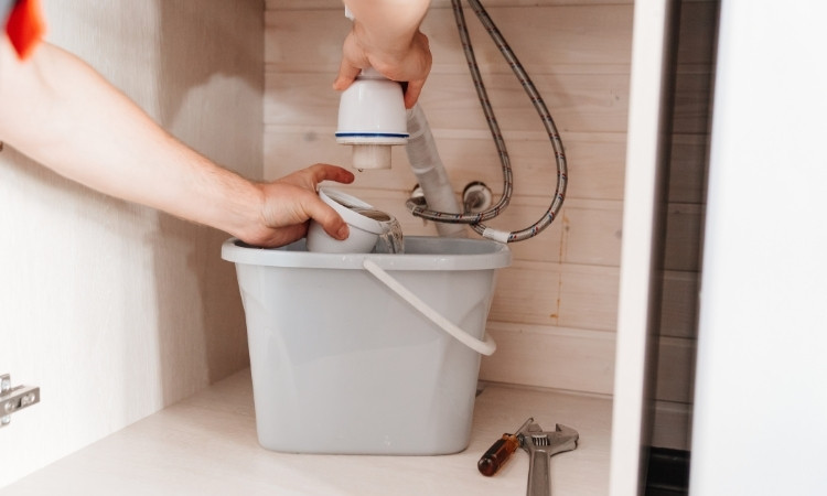 cleaning a bathroom sink drain